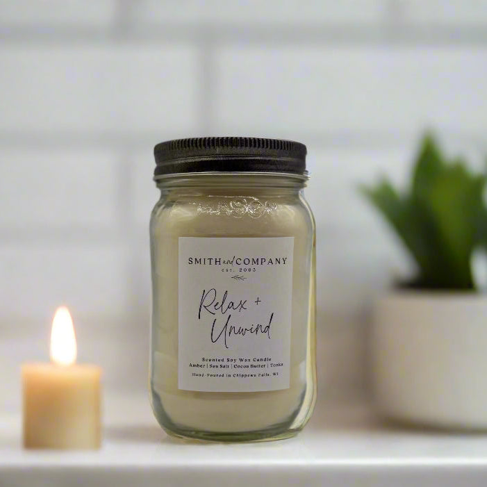 relax and unwind candle in mason jar