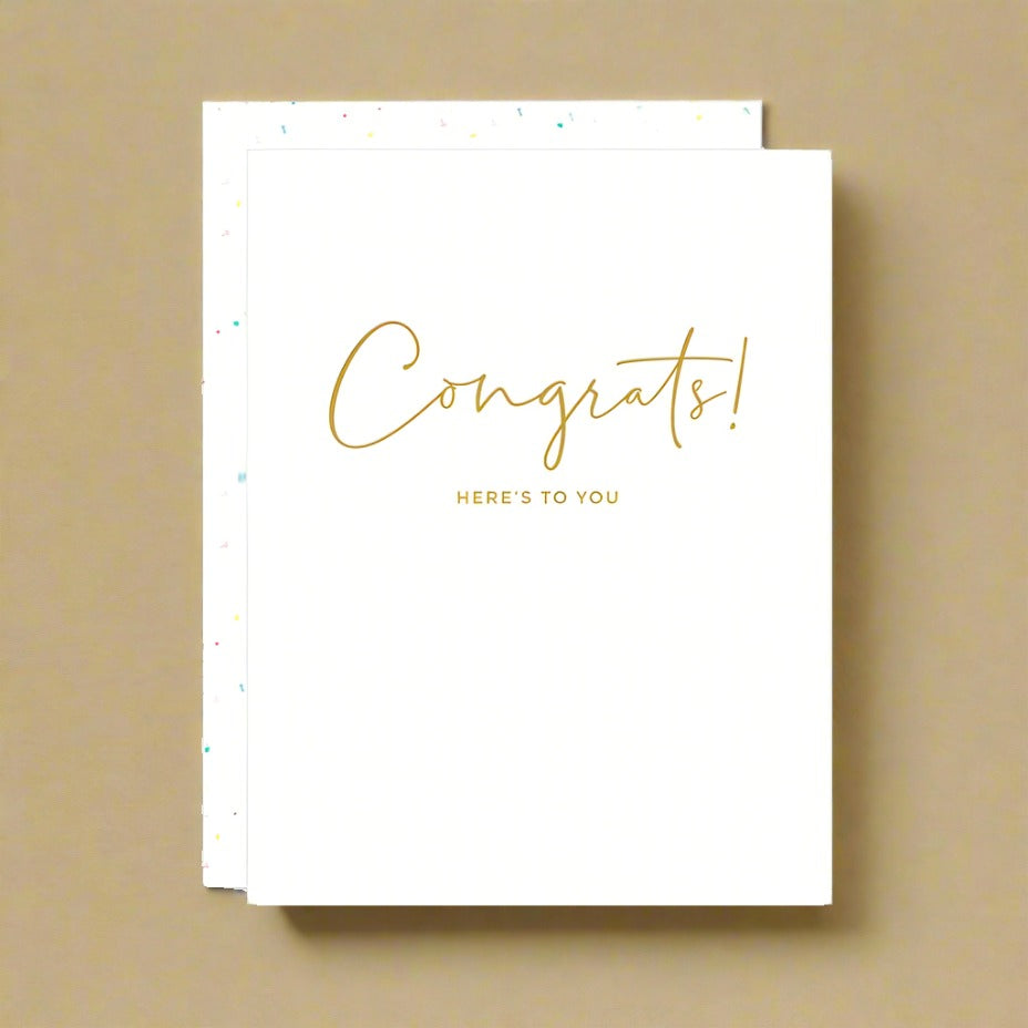 White 'Congrats - Here's to You' card with white speckled envelope
