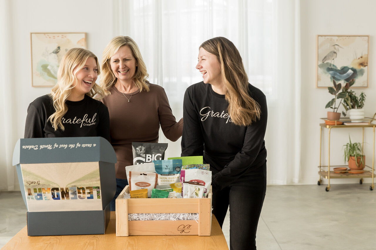 Grateful Cratefulls team together with curated gift boxes