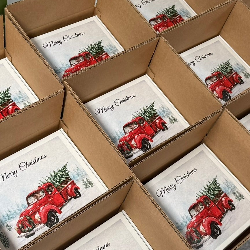 Holiday employee gift boxes prepared for a business team