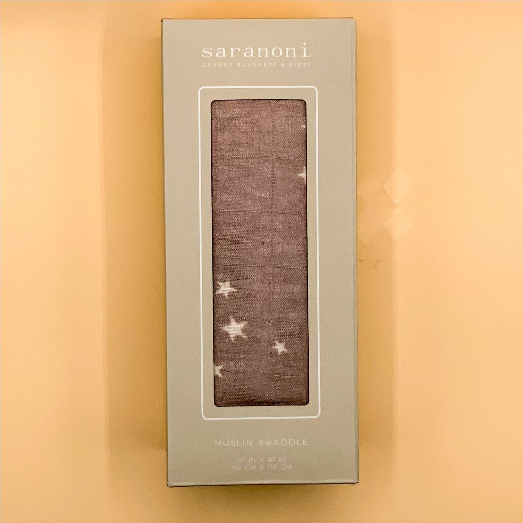 Swaddle blanket with stars in a box
