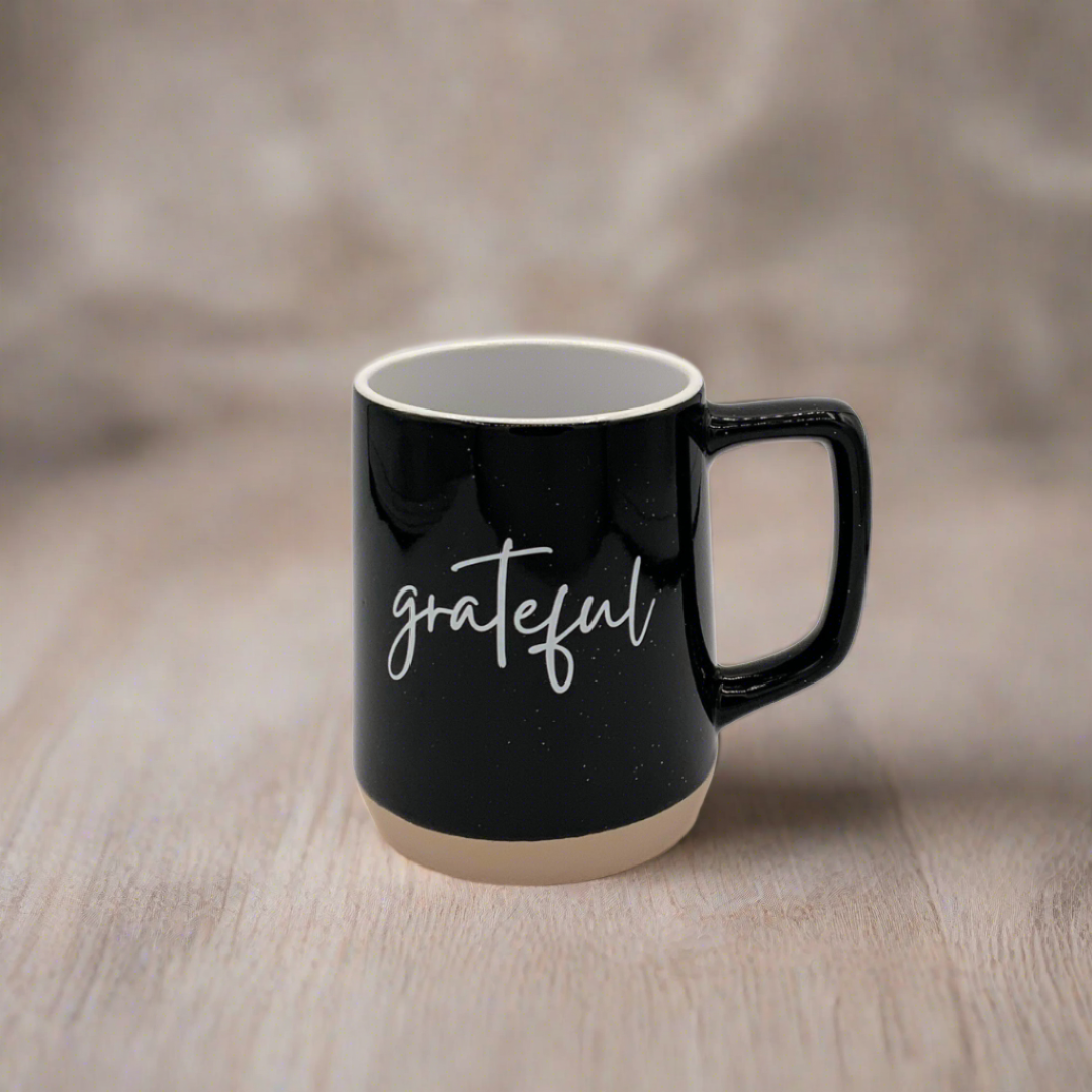 black grateful mug