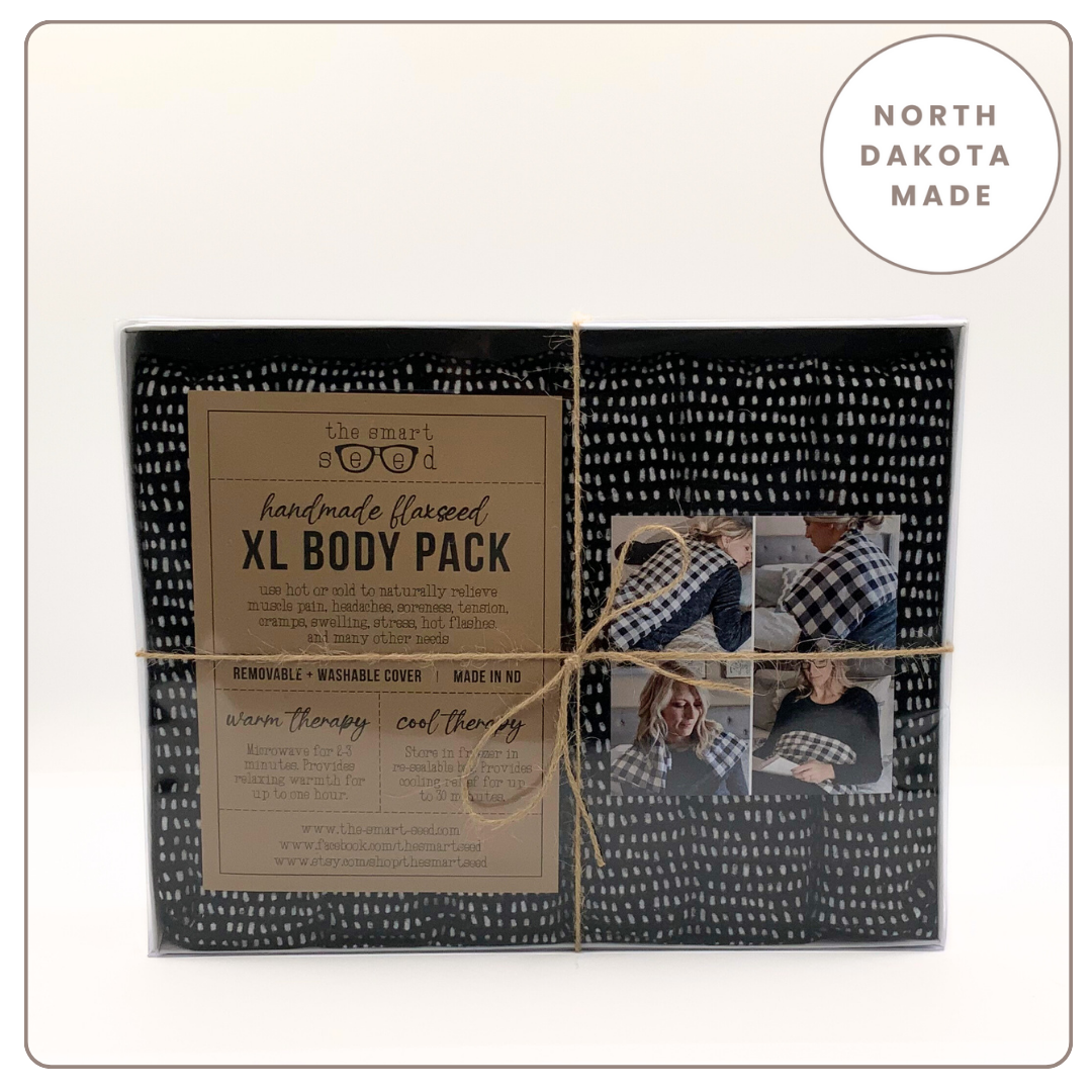 black and white XL flaxseed body pack